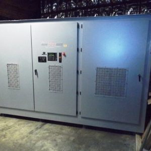 A large electrical cabinet with two doors and three different controls.