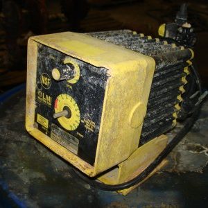 A yellow and black box sitting on top of a table.