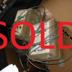 A box of wires and boxes with the word sold in red.