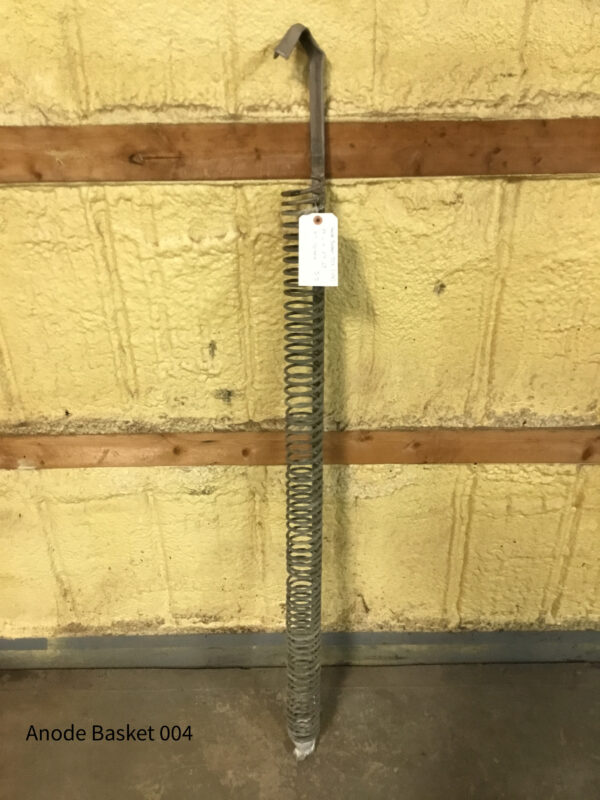 A metal pole with a tag attached to it.