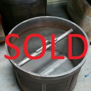 A metal drum with the word sold in red above it.