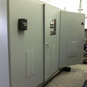 A large metal cabinet with many doors and controls.