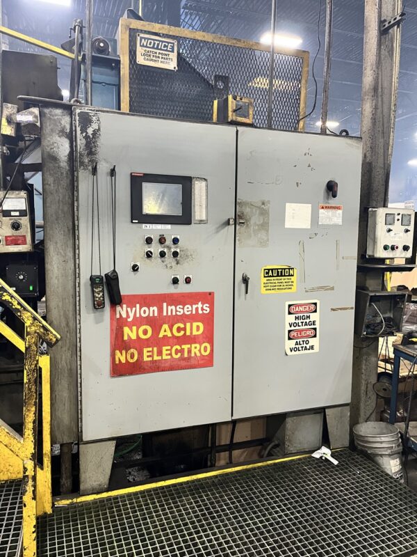 A large metal box with signs on it.